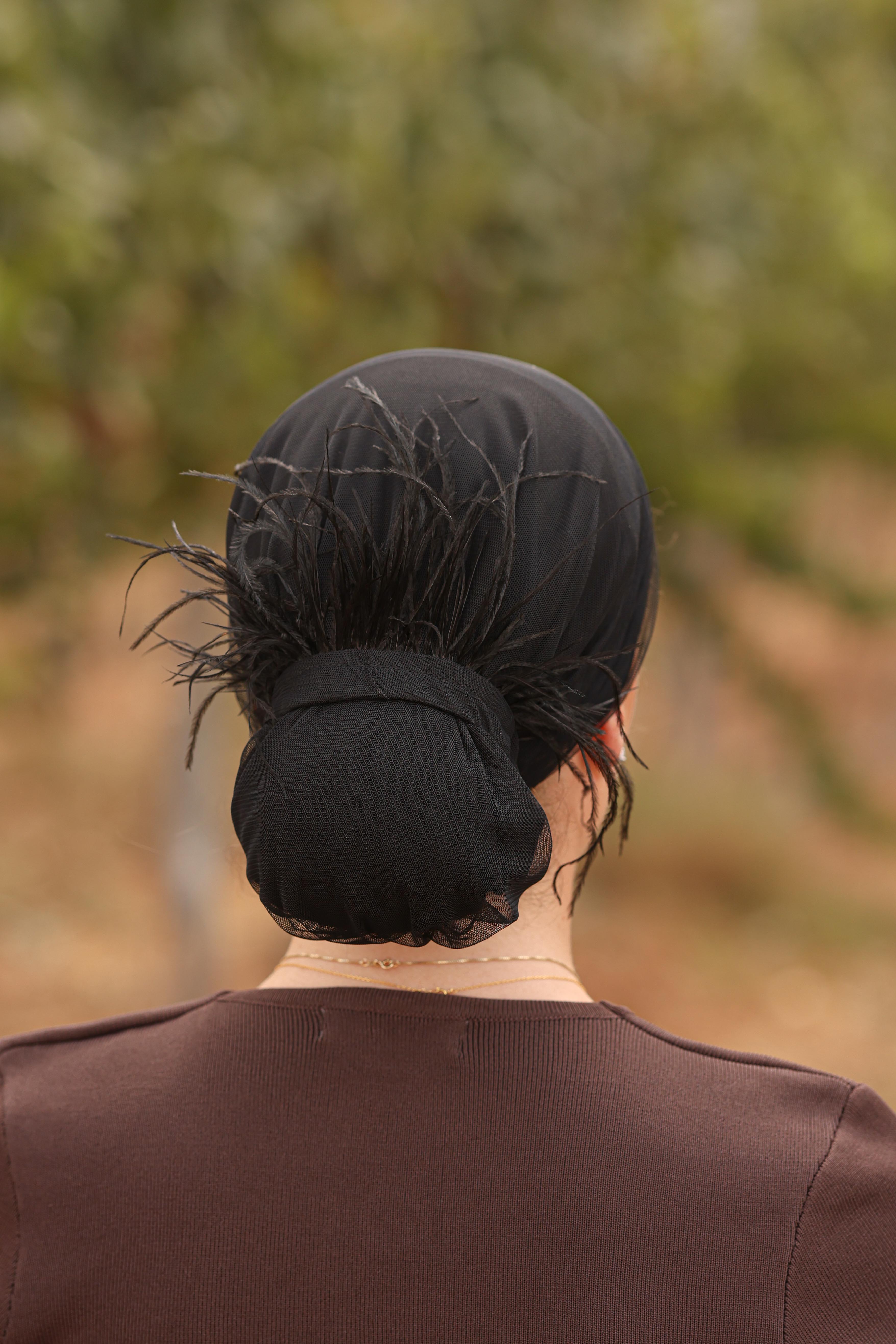 גומיית נוצות – תמונה 3