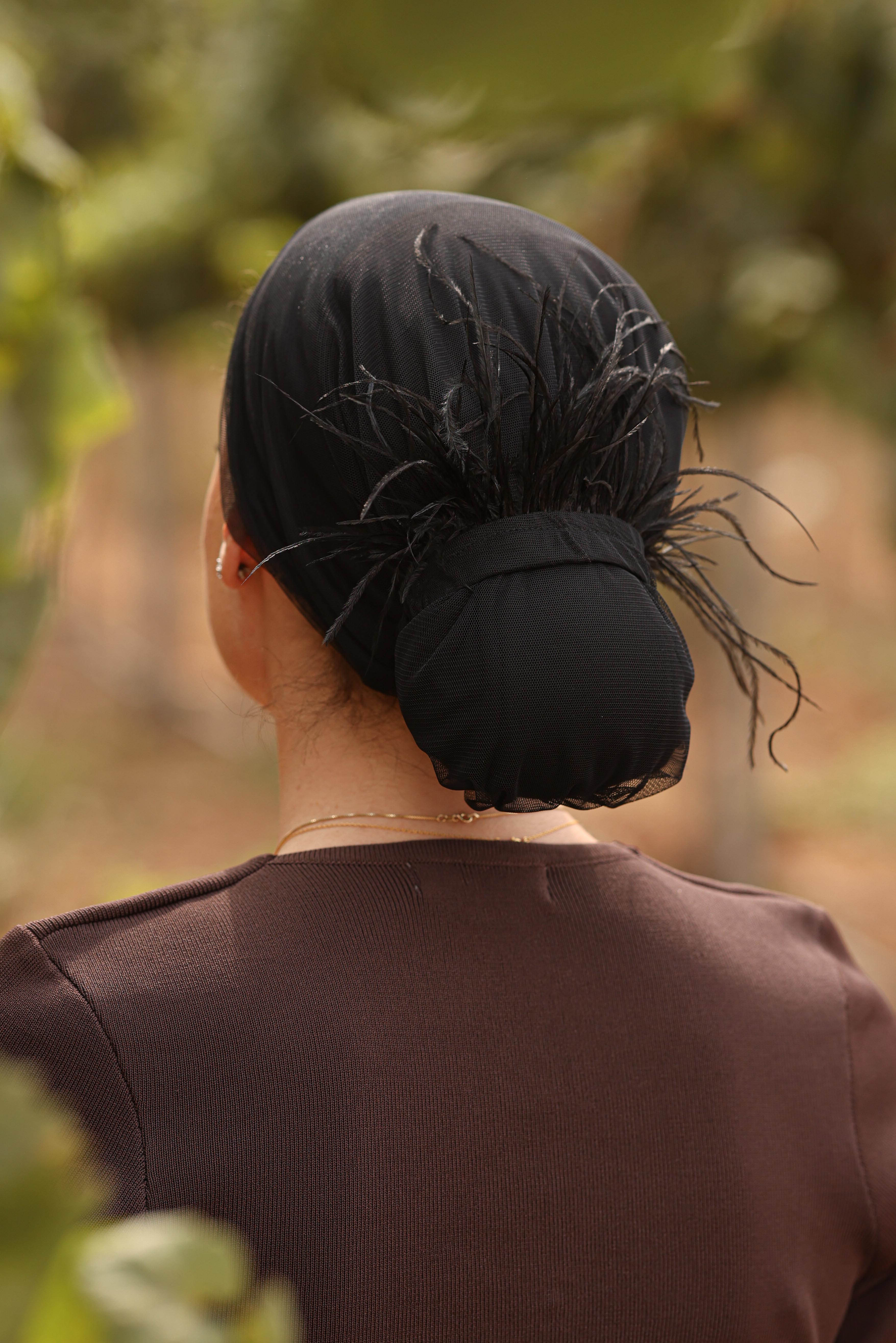 גומיית נוצות – תמונה 2